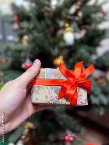 christmas gift boxes in hands
