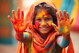 Happy Child with colorful paint on face in a Holi festival