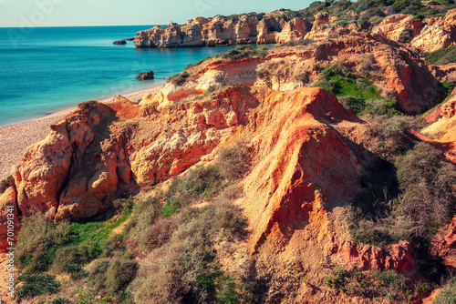 Rocky seashore. View of Praia da Marinha beach in the Algarve region in the Atlantic ocean, Portugal, Europe