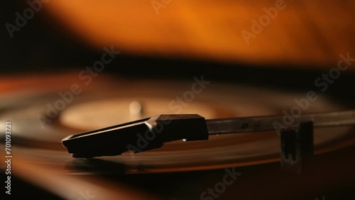 Retro vinyl record player. An old record player spins a record. Listening to music on the player. photo