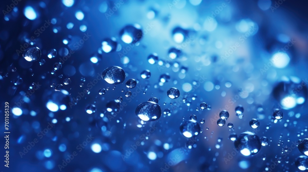 water drops on blue background macro close up with selective focus and shallow depth of field water drops on blue background macro close up with selective focus and shallow depth of field