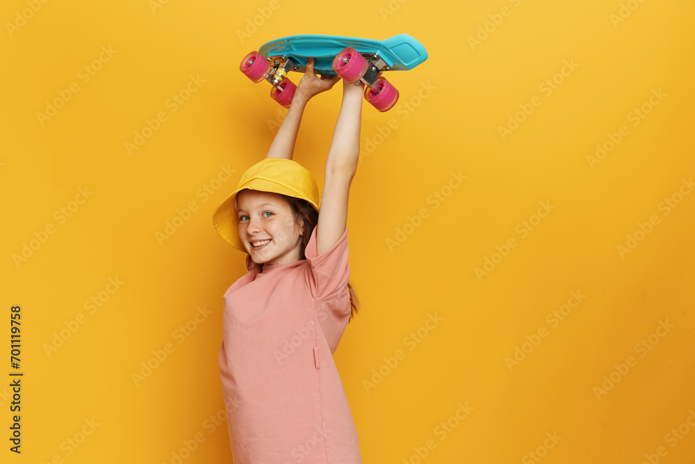 Vibrant Summer Fashion: Beautiful Young Woman in Trendy Yellow Hat Enjoying Casual Lifestyle with a Sporty Twist