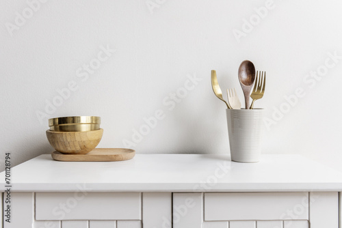 Kitchen utensils and pots on a small