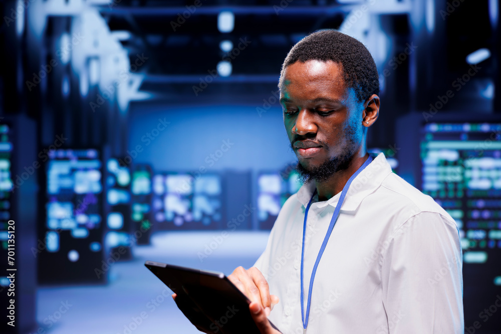 IT specialist in server farm ensuring valuable data remains shielded from potential threats, safeguarding against unauthorized access and vulnerabilities, securing system from virus attacks IT specialist in server farm ensuring valuable data remains shielded from potential threats, safeguarding against unauthorized access and vulnerabilities, securing system from virus attacks