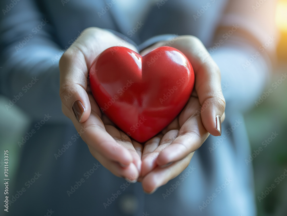 Female manager showing empathy by holding a heart-shaped symbol, emphasizing emotional intelligence and the value of cultivating soft skills Female manager showing empathy by holding a heart-shaped symbol, emphasizing emotional intelligence and the value of cultivating soft skills
