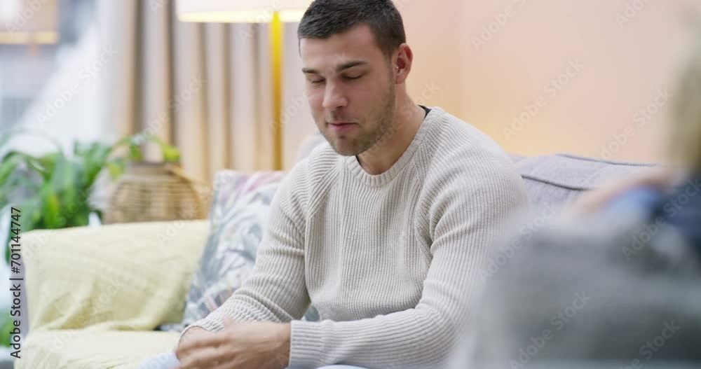 Meeting, counseling or psychology consulting for man in therapy, mental health or support on sofa. Happy client talking, psychologist listening or therapist speaking to help a lady, girl or patient