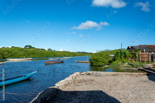 Canoes docked on the Jaguaripe River in Maragogipinho, district of the city of Aratuipe in Bahia. photo