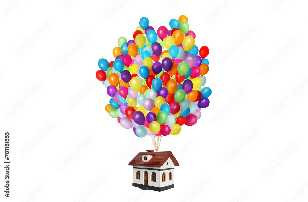Many balloons tied to model of house flying on white background Many balloons tied to model of house flying on white background