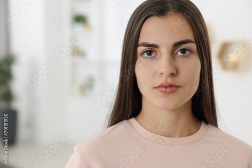 Free Download Portrait of beautiful woman indoors, space for text - GFXLoad