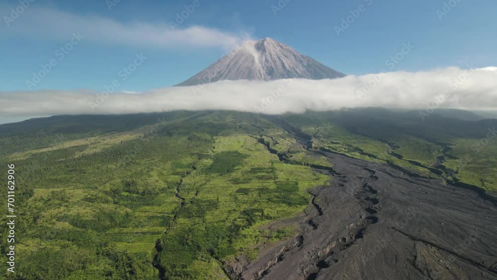 drone flight over landcape of mount, volcano Semeru, Jawa. Indonesia. Sunny day with a clouds around volcano drone flight over landcape of mount, volcano Semeru, Jawa. Indonesia. Sunny day with a clouds around volcano