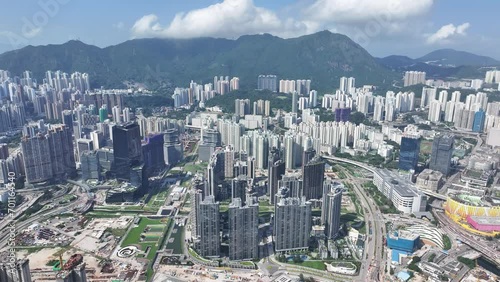 Aerial View of the skyline of Hong Kong Victoria Harbour Hung Hom Whampoa Ho Man Tin To Kwa Wan Sung Wong Toi Tsim Sha Tsui East Kowloon Peninsula,a commercial hub with the financial business  photo