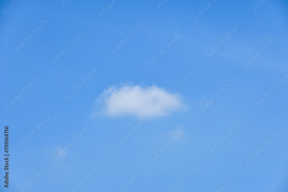 beautiful blue sky and white fluffy single cloud with sunrise in the morning, natural background beautiful blue sky and white fluffy single cloud with sunrise in the morning, natural background