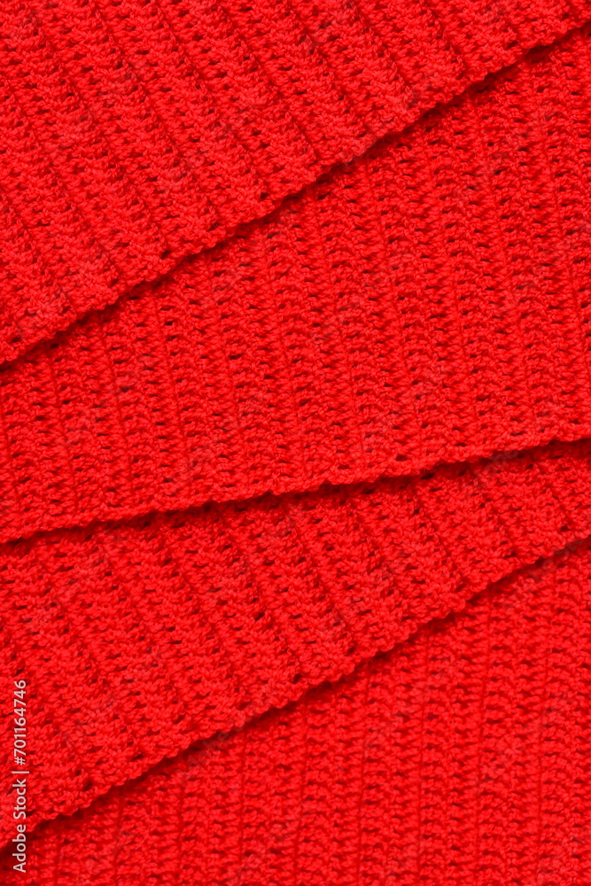 overlap of red wool knitted yarn texture, woolen fabric background