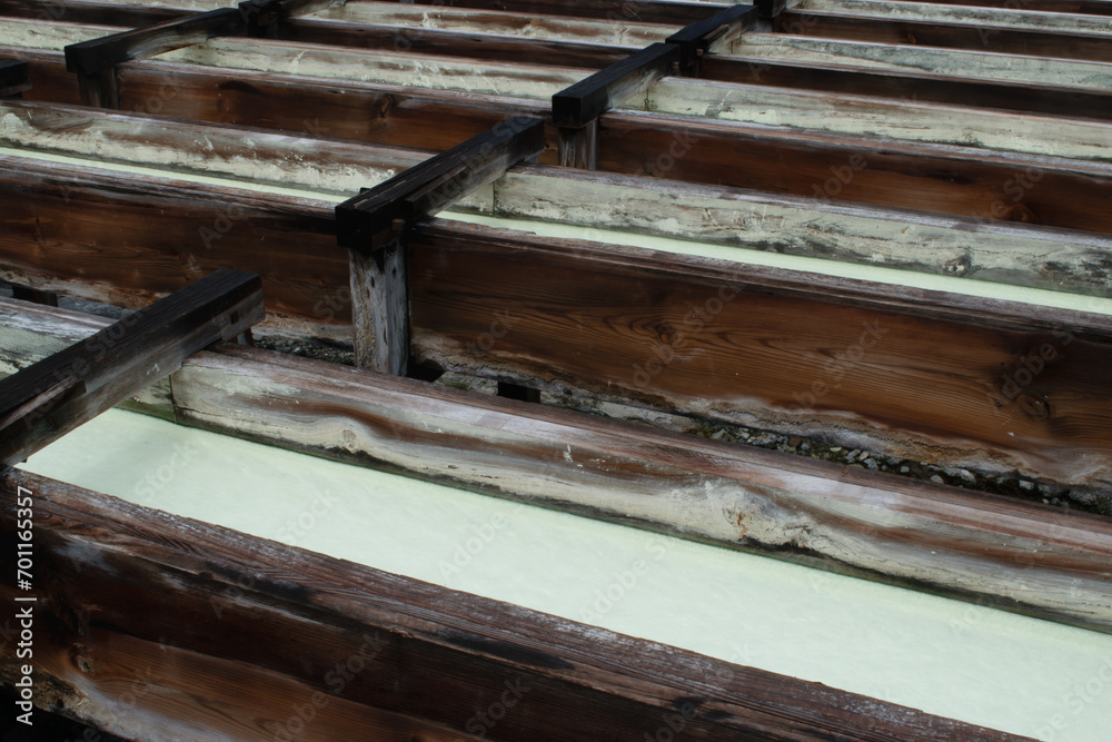 Japanese spa water running through cooling troughs Japanese spa water running through cooling troughs