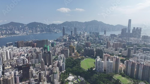 Aerial View of the skyline of Hong Kong Victoria Harbour Hung Hom Whampoa Ho Man Tin To Kwa Wan Sung Wong Toi Tsim Sha Tsui East Kowloon Peninsula,a commercial hub with the financial business  photo