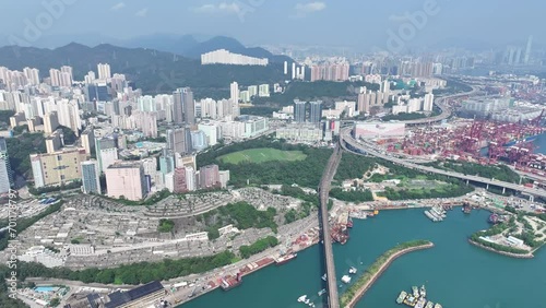 Tsuen Wan Kwai Chung and Tsing Yi ,a commercial and residential seaside satellite town, built on a bay in New Territories of Hong Kong, Aerial drone City skyview photo