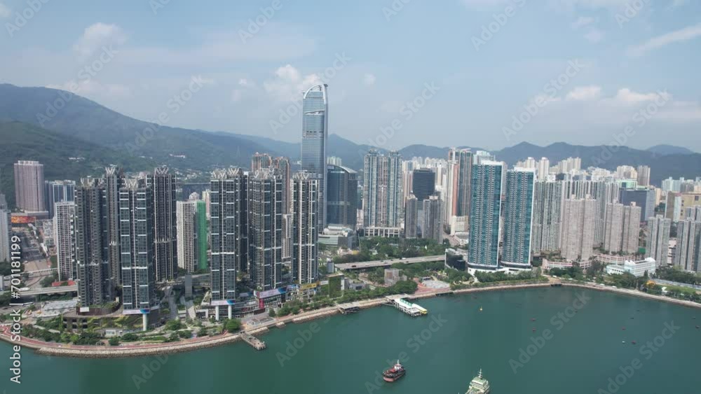 Tsuen Wan Kwai Chung and Tsing Yi ,a commercial and residential seaside satellite town, built on a bay in New Territories of Hong Kong, Aerial drone City skyview Tsuen Wan Kwai Chung and Tsing Yi ,a commercial and residential seaside satellite town, built on a bay in New Territories of Hong Kong, Aerial drone City skyview
