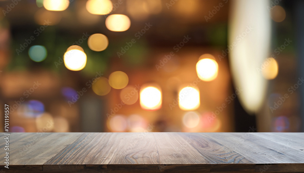 Empty dark wooden table in front of abstract blurred bokeh background of restaurant . can be used for display or montage your products. Mock up for space