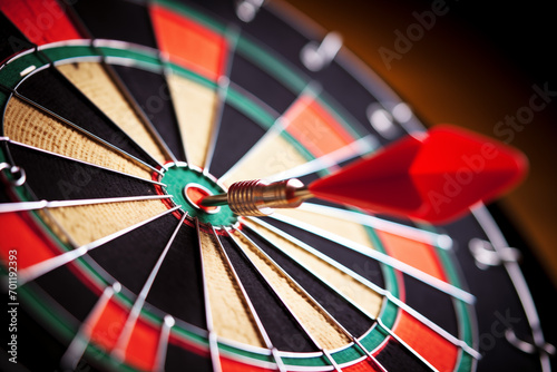 Dart on dartboard that expressing to focus target and strategy