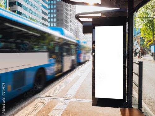 Blank white Media Advertising banner sign at Bus stop City street Mock up board template