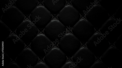Genuine luxurious of an elegant vintage square pattern black leather seat car, sofa,cushions,upholstered furniture in retro style with thread pattern, black leather padded background.Close-up © surasak
