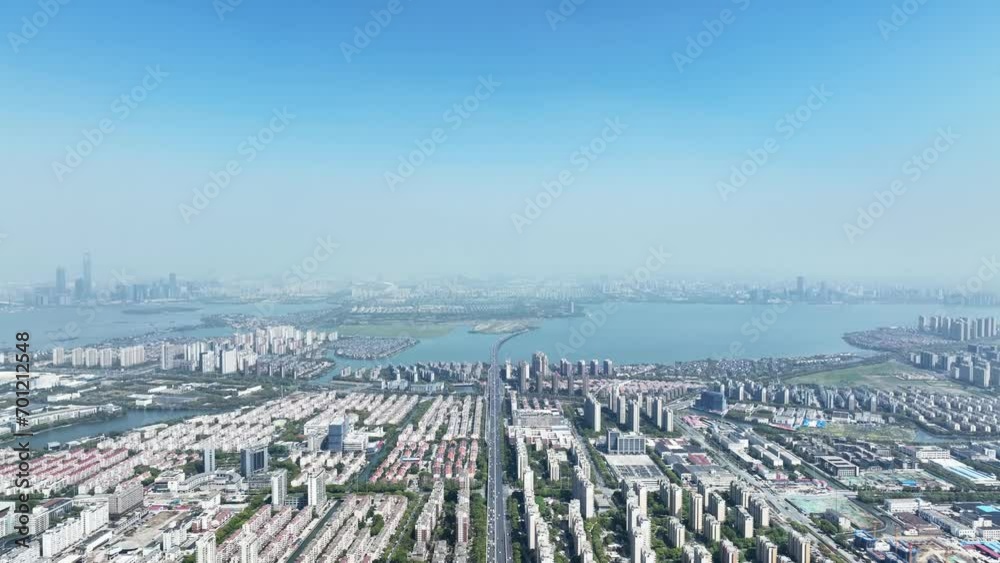 view of modern city near lake view of modern city near lake
