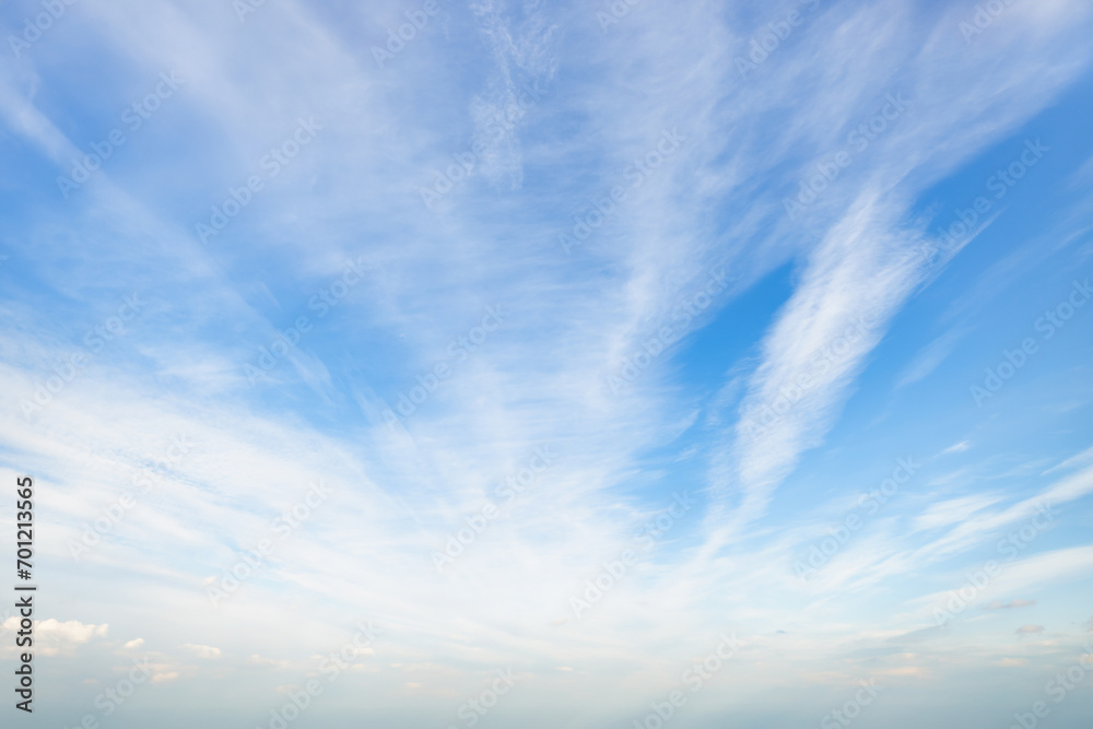 Obraz premium A beautiful sky tinted by the sun leaving vibrant shades of gold, pink, blue and multicolored. Clouds in the twilight evening and morning sky. Cloudy sky background in the evening and during the day.