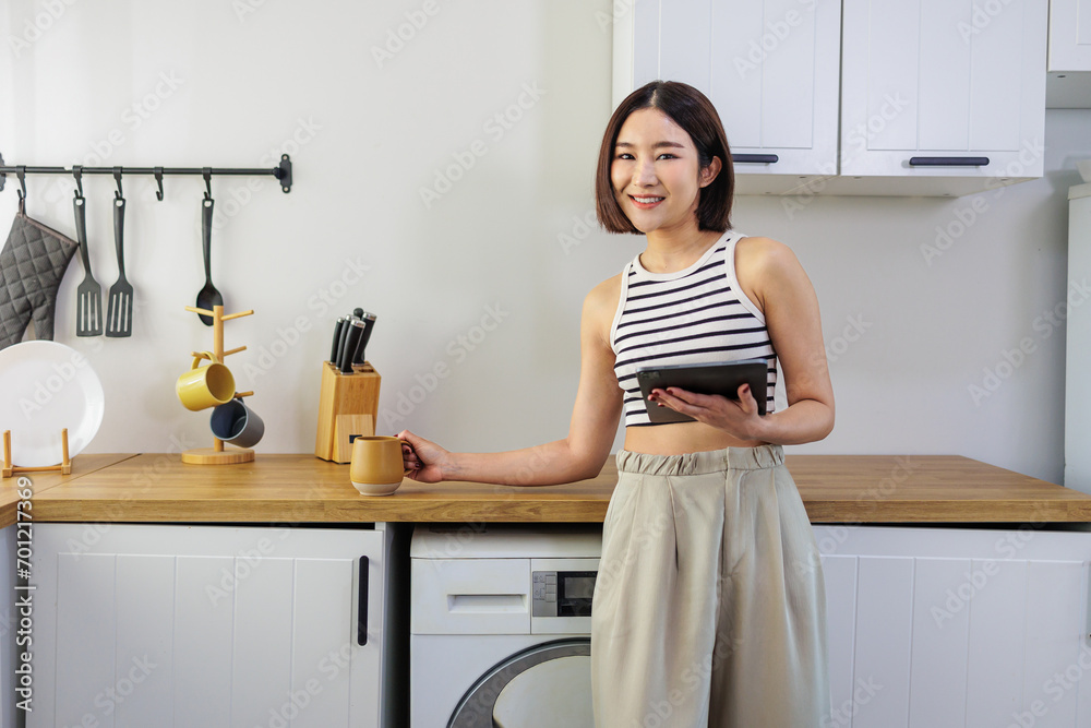 Modern Kitchen Lifestyle, Enjoying Tech with Morning Coffee Modern Kitchen Lifestyle, Enjoying Tech with Morning Coffee