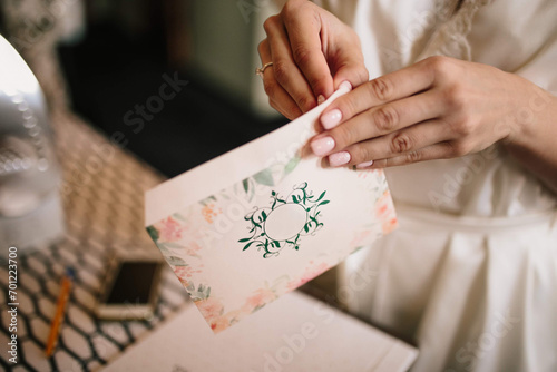 The bride packs an envelope