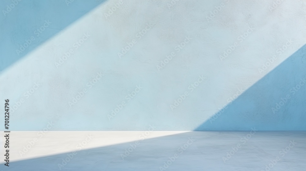 Empty wall with light blue tones with sunlight shining in Empty wall with light blue tones with sunlight shining in