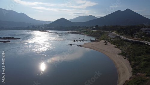 Reflection of sun in wide river in Northest of Thailand photo