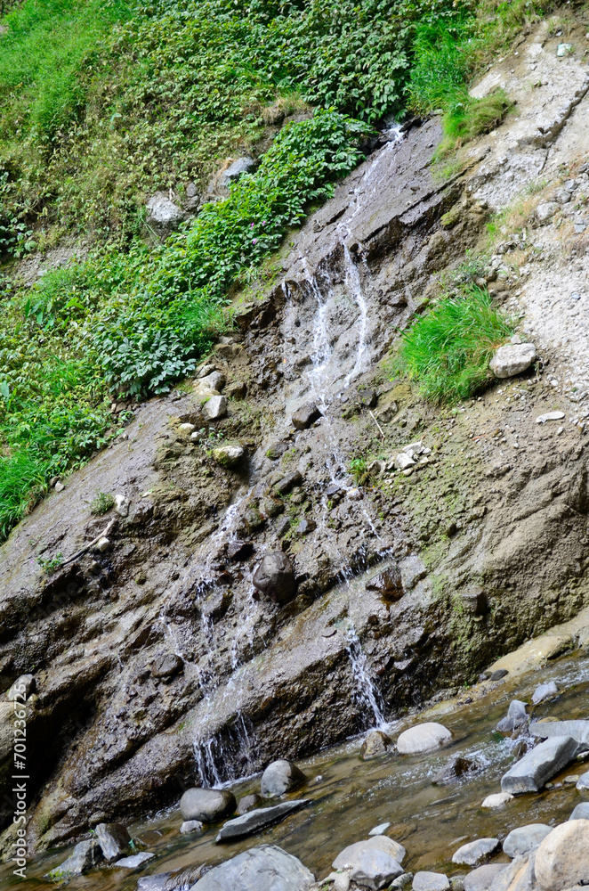 Beautiful waterfall with very beautiful scenery and shady trees Beautiful waterfall with very beautiful scenery and shady trees