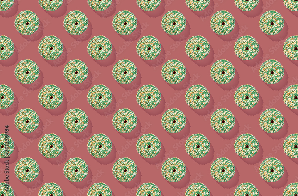 Pattern of donuts on pink pastel background Pattern of donuts on pink pastel background