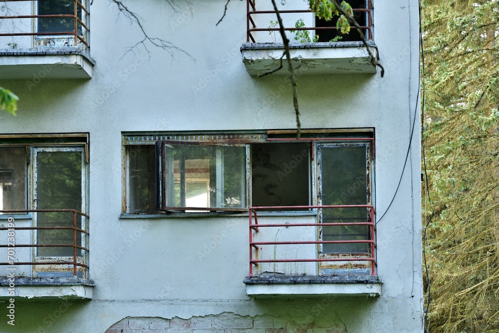 View of the old iron concrete balconies of the destroyed building