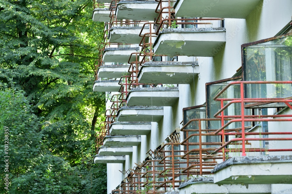 View of the old iron concrete balconies of the destroyed building