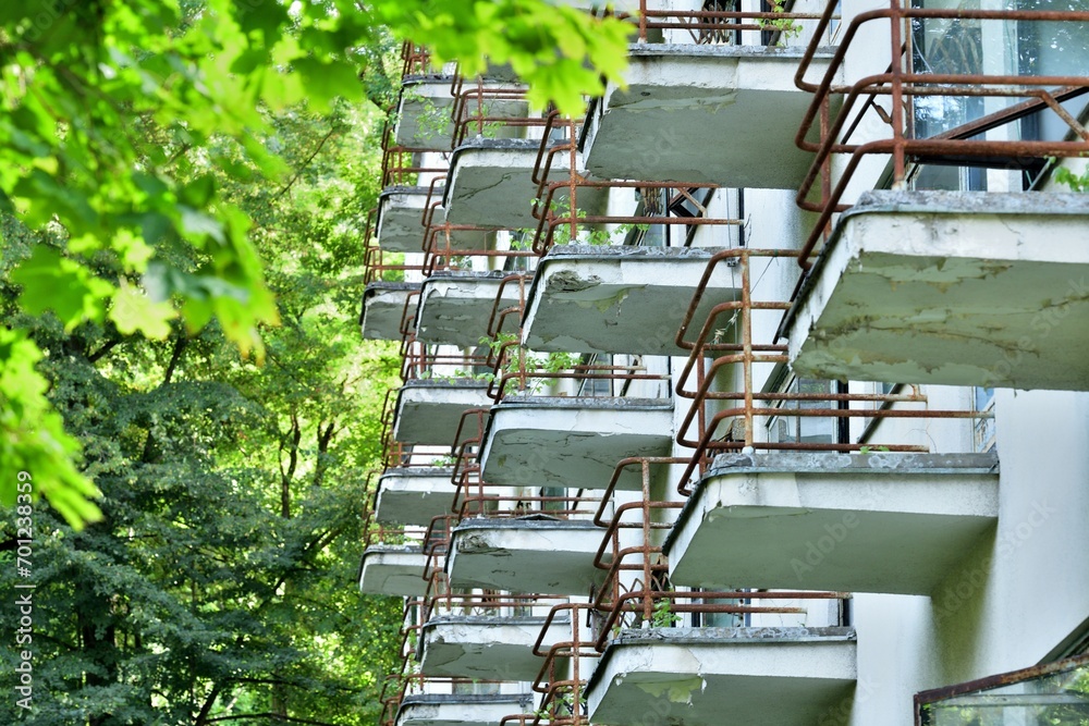 View of the old iron concrete balconies of the destroyed building