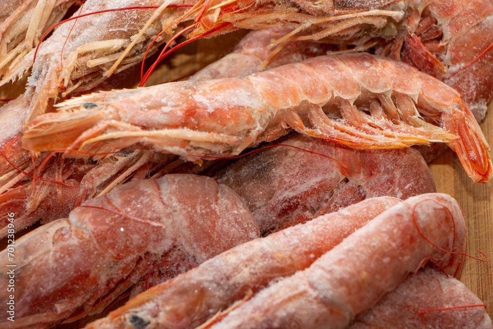 Raw wild Argentinian red shrimps/prawns and ingredients for cooking. Delicious food. Keto / Paleo Diet.