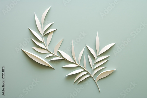 Nature, environment, graphic resources concept. Simple and minimalist floral cut paper art on plain background with copy space. Soft muted pastel colors. Leaf, flower or tree twig gutted from paper #701251313