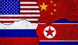 Flags of United States of America, China, Russia and North Korea on a wall. China North Korea USA Russia relations