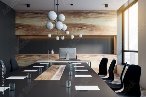 Close up of table with objects in contemporary conference room. Blurry interior background. Workplace concept. 3D Rendering. photo