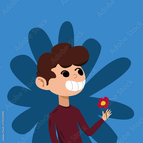 мальчик с цветком в руке на голубом фоне