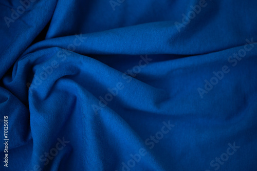 blue fabric with soft waves photo