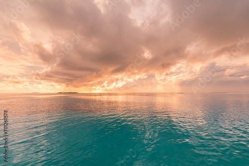 Sea ocean horizon. Skyscape with seascape. Orange gold sunset sky calm water surface, tranquil relaxing sunlight, sun rays. Inspire nature panoramic view. Meditation peaceful sunrise, dream heaven 