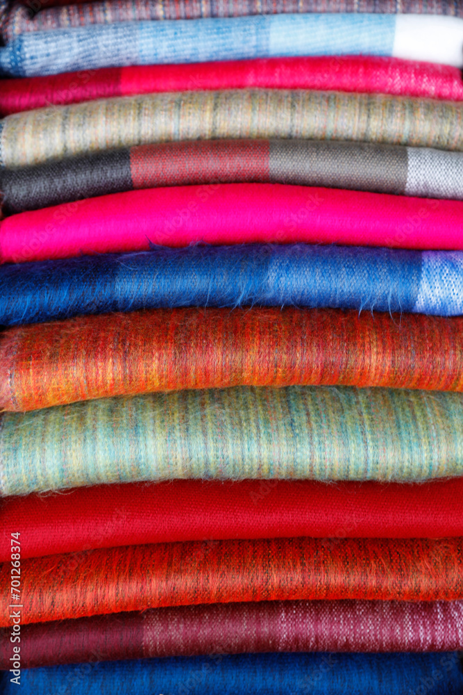Woolen shawls and scarves sold at Otavalo market, Ecuador Woolen shawls and scarves sold at Otavalo market, Ecuador
