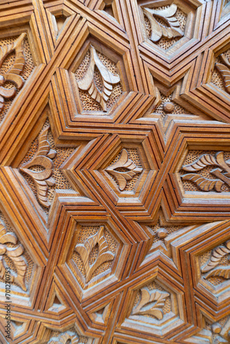 Handmade wooden door with different textures.