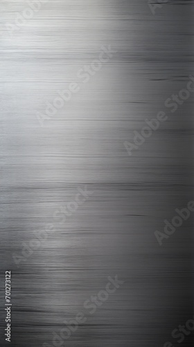 Industrial chic meets sophistication in this textured metallic surface of brushed steel, reflecting light and style