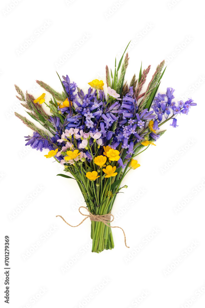 Spring wildflower arrangement bouquet of British meadow flowers for Beltane on white background. Floral nature composition.