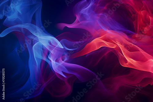 Abstract freeform blue smoke, red, purple, black background. Soft focus.