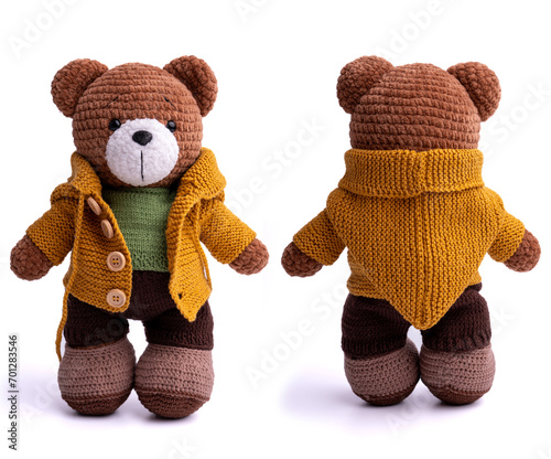 Handmade crocheted bear toy, amigurumi, isolated.