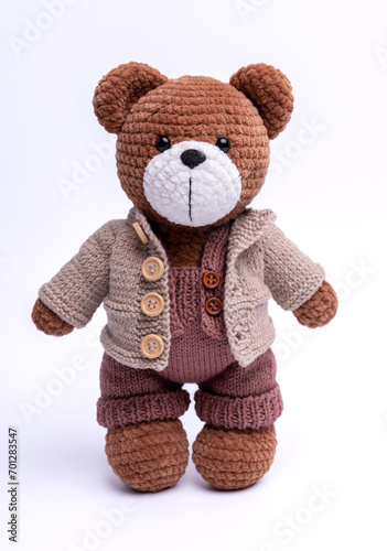 Handmade crocheted bear toy, amigurumi, isolated. © O.B.